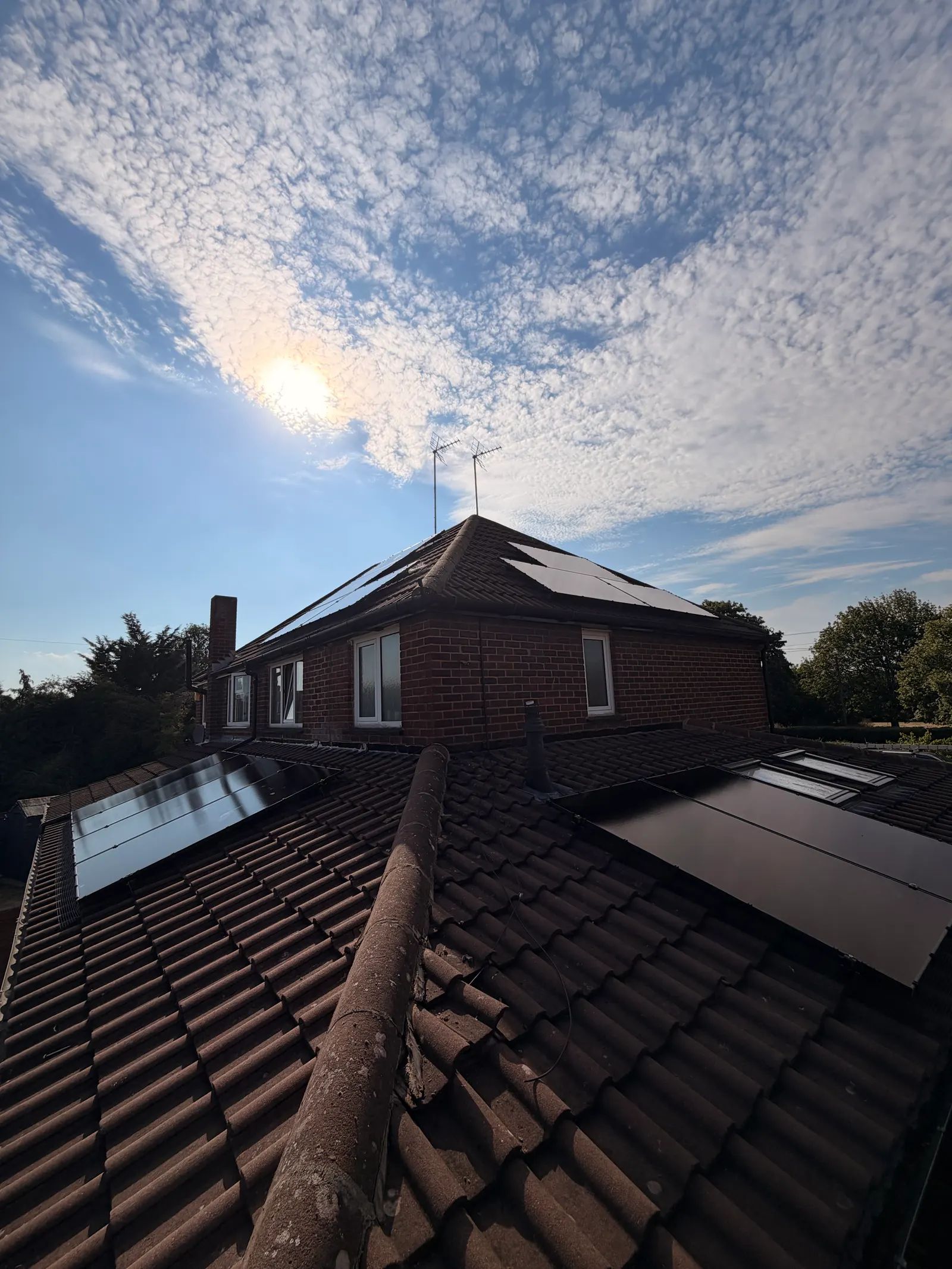 Completed ECONEXIS solar installation in Leighton Buzzard against the evening sky